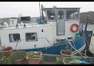 Barge Steilsteven Huizen aan water 1932, met Gardner motor, The Netherlands