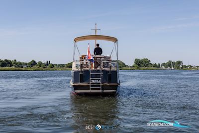 St. Jozef 1050 Salon Motorbåd 1985, med Volvo Penta is Een Toonaangevende Fabrikant Van Maritieme Aandrijfsystemen, Motoren en Accessoires, Bekend om Zijn Innovatieve en Betrouwbare Technol motor, Holland