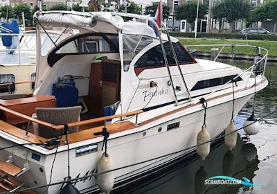 Trojan Yacht 25 Express Motorboten 1974, met Mercruiser Black Scorpion motor, België