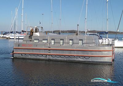 Katamaran Huizen aan water 2002, met Solé 26 Mini motor, Denemarken