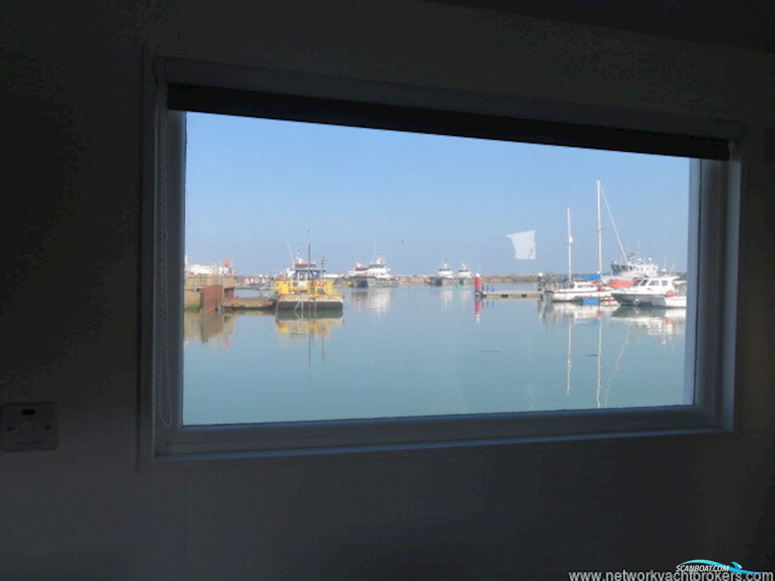 Houseboat Powercat 40 Converted to a