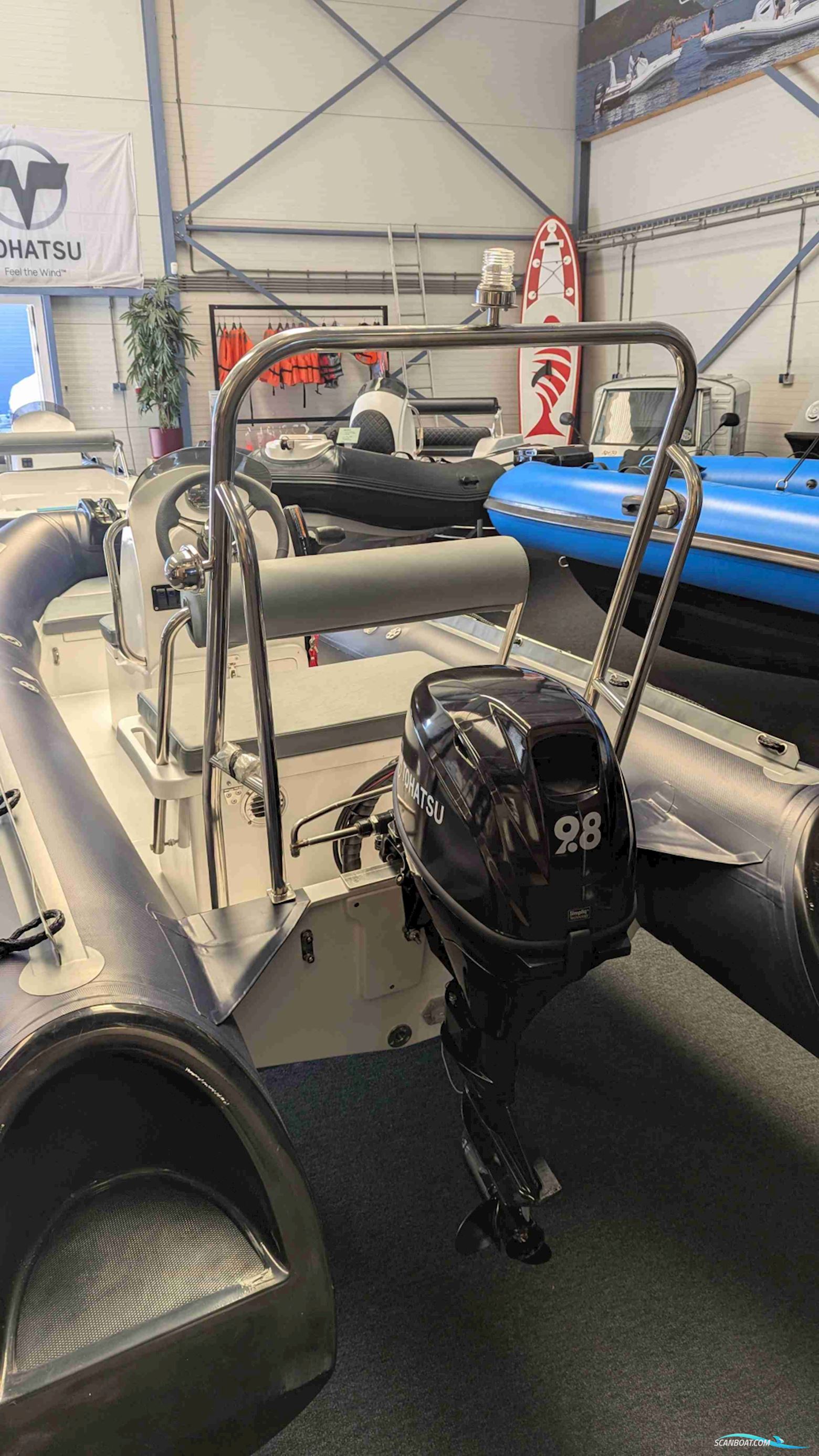 Excellent 390 BF incl. Tohatsu 9,8