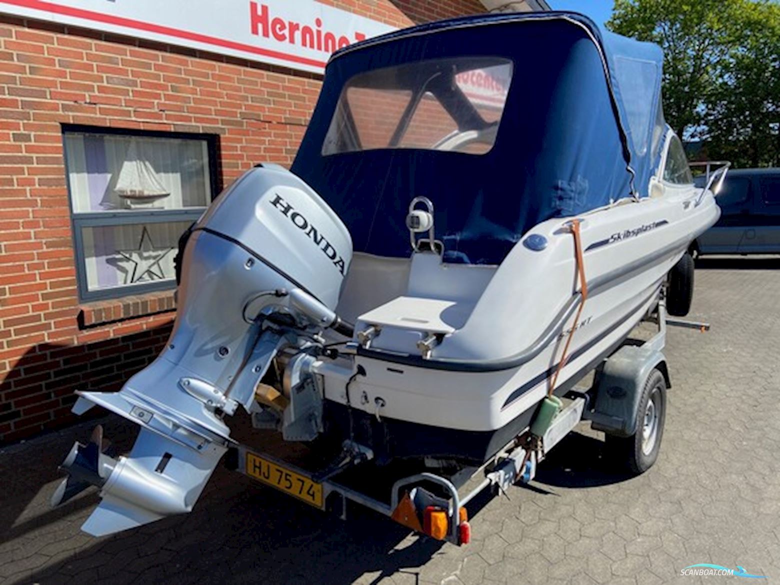 Skibsplast 555 HT m/Honda F100 hk og Brenderup trailer