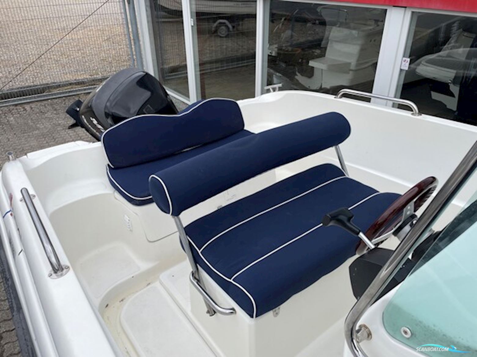 X enes Explorer 570 med Mercury 115 HK Optimax og Tysse Bådtrailer