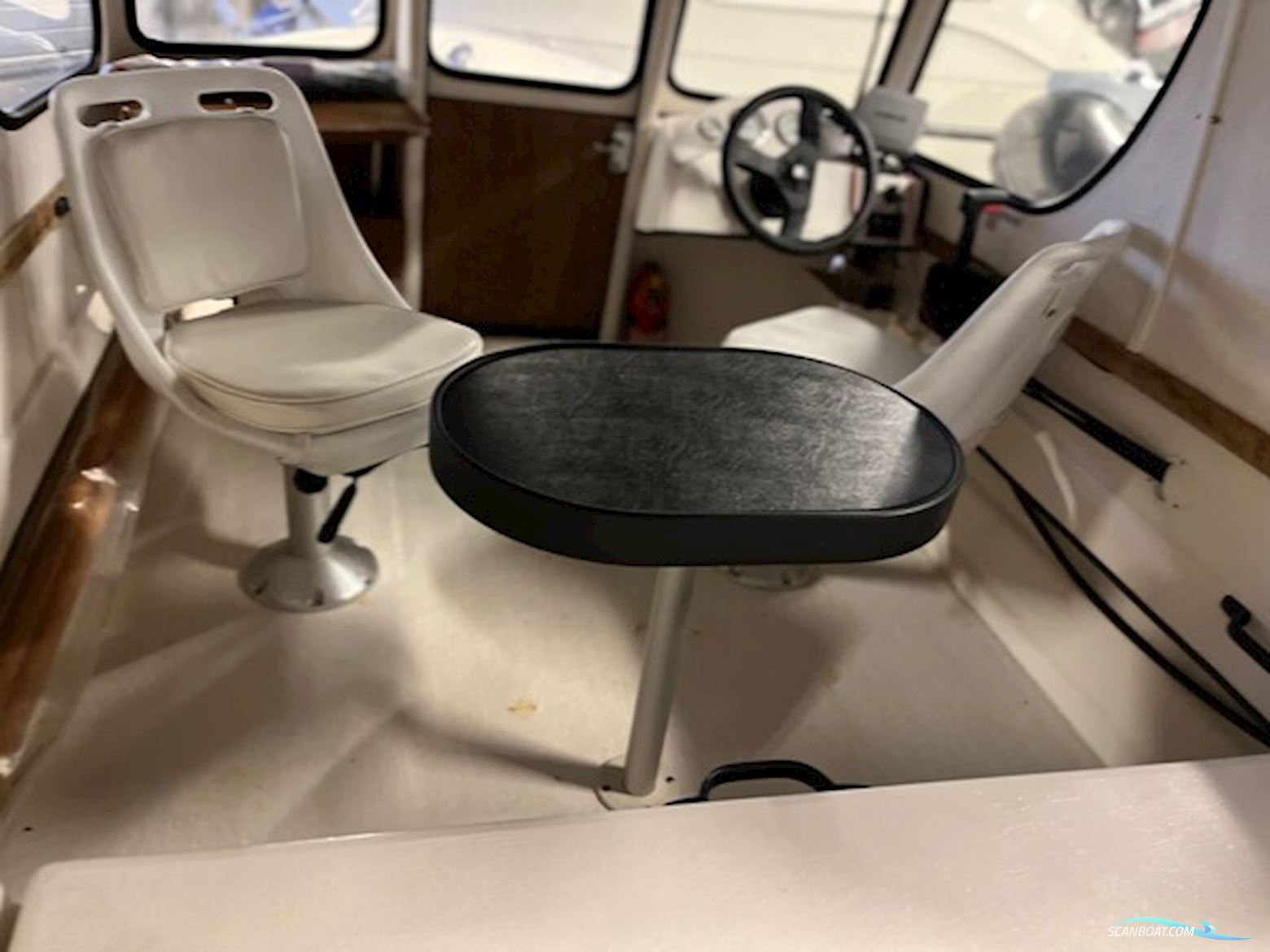 Uttern C56 med 60 hk Mercury-EFI 4 takt.