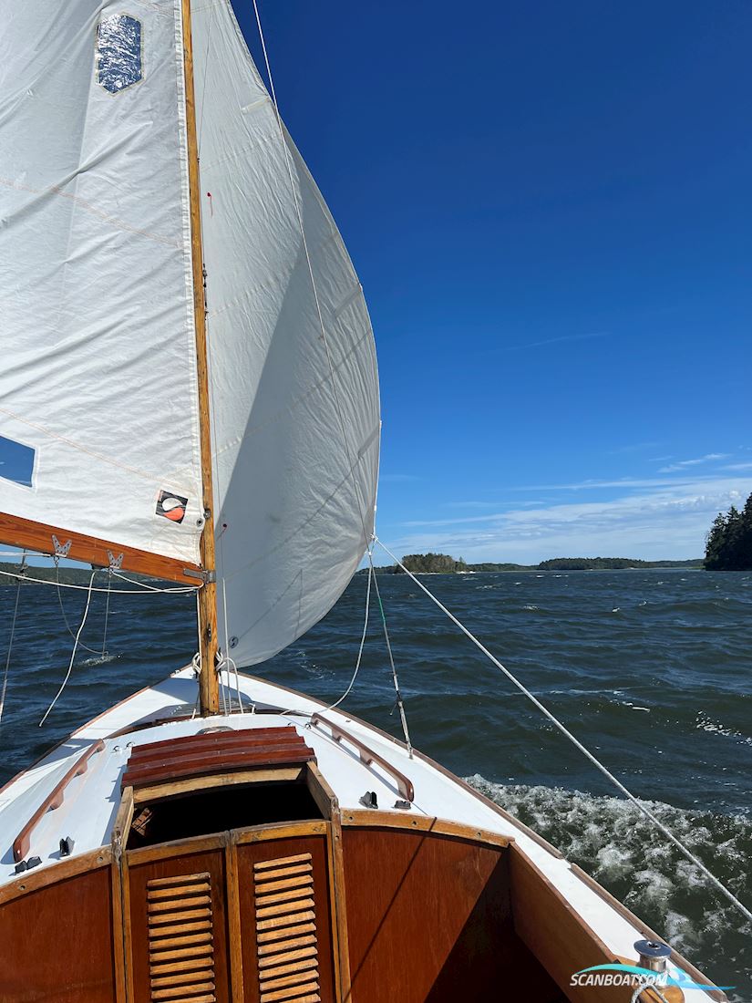 Folkboot Nordic Sailingboat 1969, with Suzuki 7.5 hp engine, Sweden
